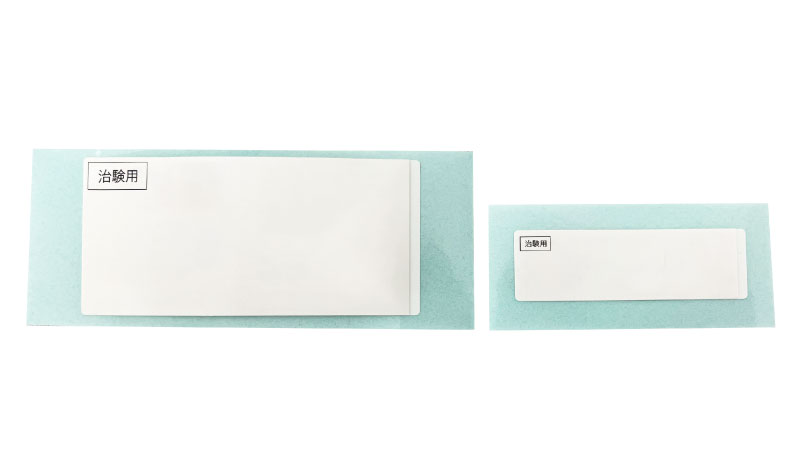 外装箱用とバイアル瓶用のブックレットラベル